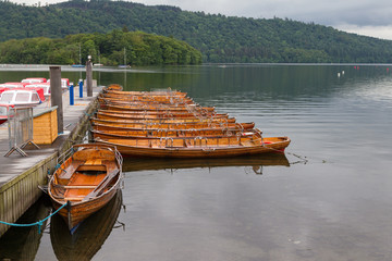 Pier and Moored rowing boats in Bowness-on-Windermere, UK