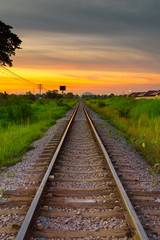 Fototapeta na wymiar Railroad at sunset