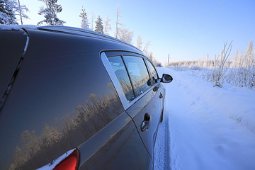 Car winter road snow forest tour