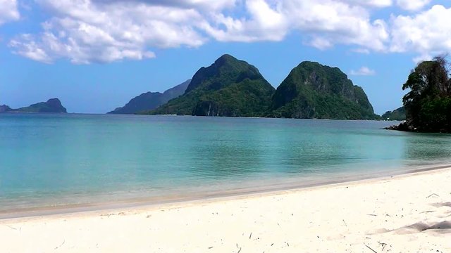 The Las Cabanas beach of the tropical island. El Nido. Palawan island. Philippines.