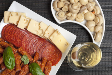 Salami, kabanos, cheese starters and wine