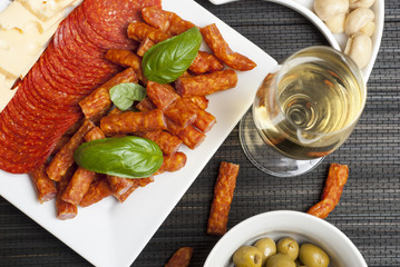 Salami, kabanos, cheese starters and wine