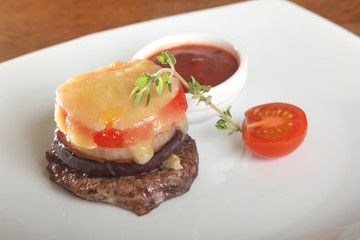 beef steak with tomato cheese