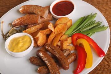 beer snack of sausages and mashed potatoes
