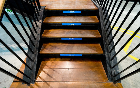 Stairway to Health concept. Caleries sticker measurement on stairway