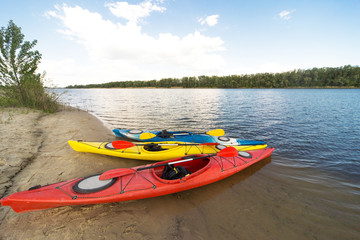 Camping with kayaks on the beach.
