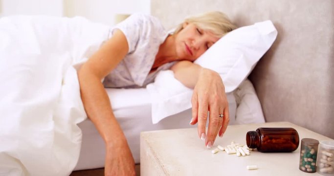 Woman lying motionless after overdose of pills