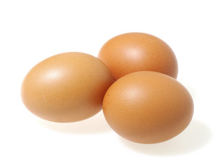 Fresh chicken eggs isolated on white background