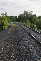 Obraz premium Tracks and railway crossing in the background.