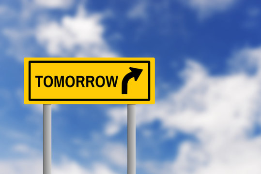 Tomorrow sign on traffic yellow plate