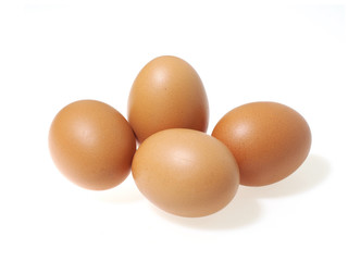 Fresh chicken eggs isolated on white background