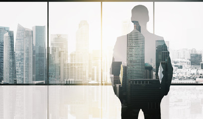 silhouette of business man over office background - obrazy, fototapety, plakaty