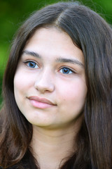 Close-up portrait of teen girl of 14 years