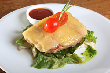 meat with cheese on lettuce