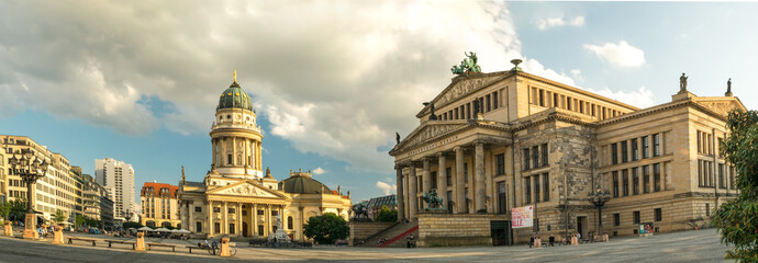 Fototapeta na wymiar Gendarmenmarkt, German Cathedral in evening light at sunset with clouds