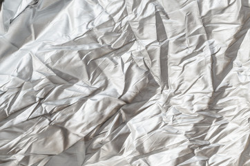 Creased white cloth background