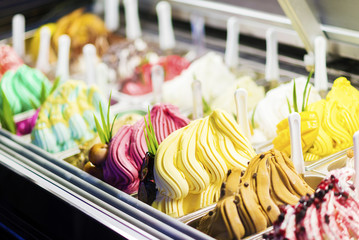 mixed colourful gourmet ice cream sweet gelato in shop display - obrazy, fototapety, plakaty