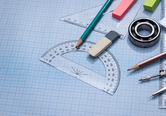 blue graph paper with drawing tools