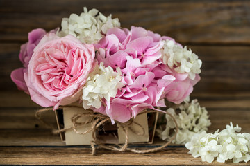 beautiful flowers on wooden background, various , place for text, closeup