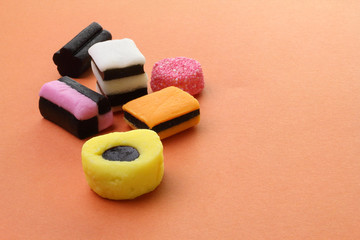 Liquorice Allsorts or Licorice Allsorts on a plain background