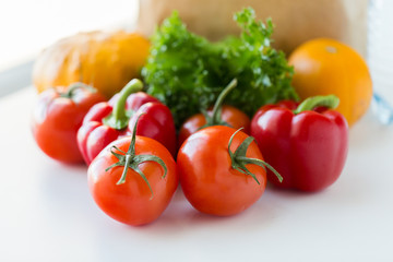 close up of fresh ripe vegetables on kitchen table