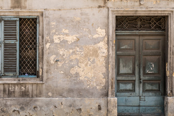 Fototapeta na wymiar Grungy old door and window, Valletta, Malta