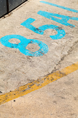 85A colourful markings on concrete road