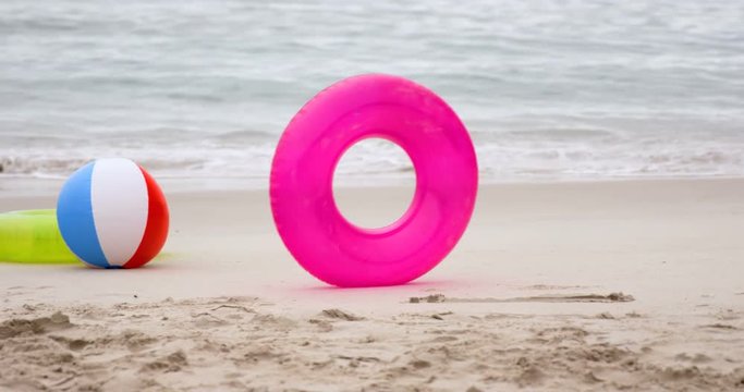 View of rolling buoy on the beach in slow motion
