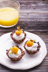 Granola cups filled with yogurt and fresh berries