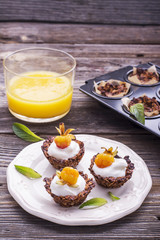 Granola cups filled with yogurt and fresh berries