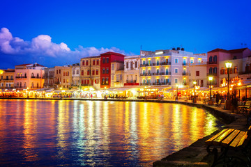 Obraz premium illuminated venetian habour of Chania at night, Crete Greece, , toned