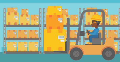 Naklejka premium Warehouse worker moving load by forklift truck.
