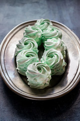 Meringue on silver tray.