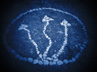 Figure inlaid stones on the ground