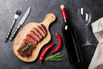 Grilled striploin steak and wine