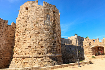 Fototapeta na wymiar Tower of the Fortifications of the Old Town of Rhodes by the Gate of Saint Paul, Greece.