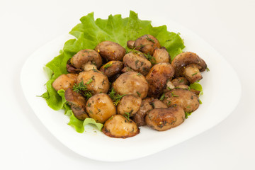 Baked mushrooms in a garlic butter with parsley