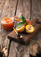 Peaches on a wooden background