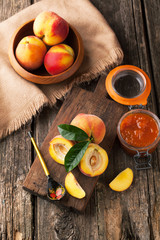 Peaches on a wooden background