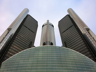 Shiny tall corporate glass skyscrapers in Detroit, MI