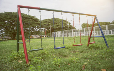 Fototapeta premium playground of children and young in a park,selective focus,filtered image,light effect added