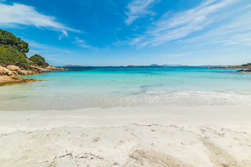 Fototapeta na wymiar Capriccioli beach in the summertime