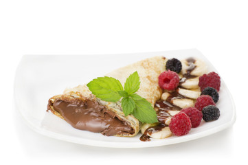 Crepes with chocolate cream and banana