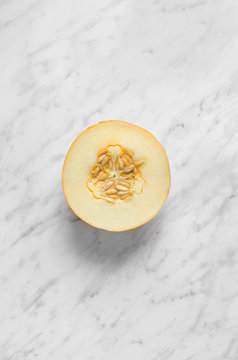 Melon from the top on a marble table