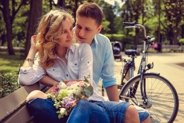 Casual couple in a summer park.