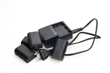Lithium battery and charger for digital photo cameras on isolate