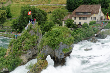 A small island splitting the waterfall Rheinfall apart