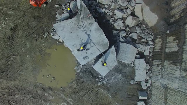 Flying over the stone quarry. Extraction of granite stone. aerial survey