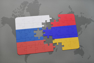 puzzle with the national flag of russia and armenia on a world map background.