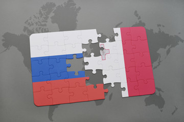 puzzle with the national flag of russia and malta on a world map background.